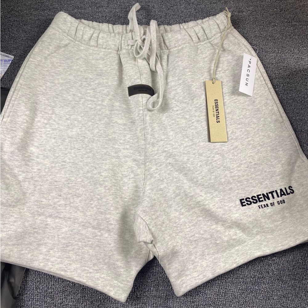 Fear of God Essentials light oatmeal shorts